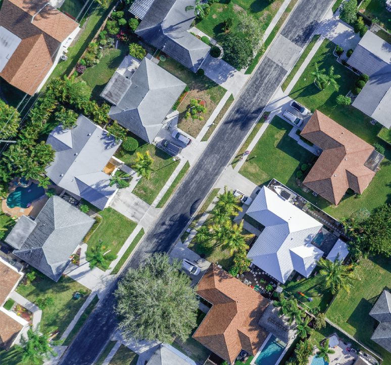 Background Image of Overhead Arial shot of a neighborhood home service franchise